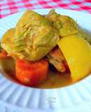 Pollo en salsa de limón encurtido y zanahorias dulces orgánicas