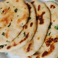 A picture of Garlic_Naan       homemade.