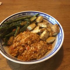A picture of Jollof Rice, Fried Okra & Spiced Tofu.