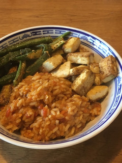 A picture of Jollof Rice, Fried Okra & Spiced Tofu.