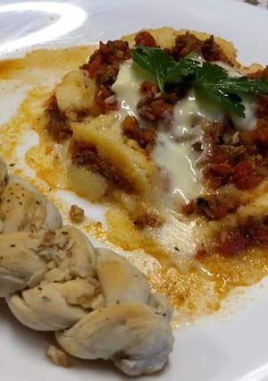 Una foto de Pasticho y focaccia con nuez