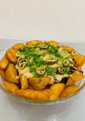 صورة لوصفة بطاطا ودجز مع حمسه اللحم والأجبان 😋