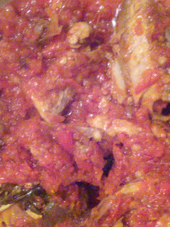 A picture of Palmoil stew and smoked fish.