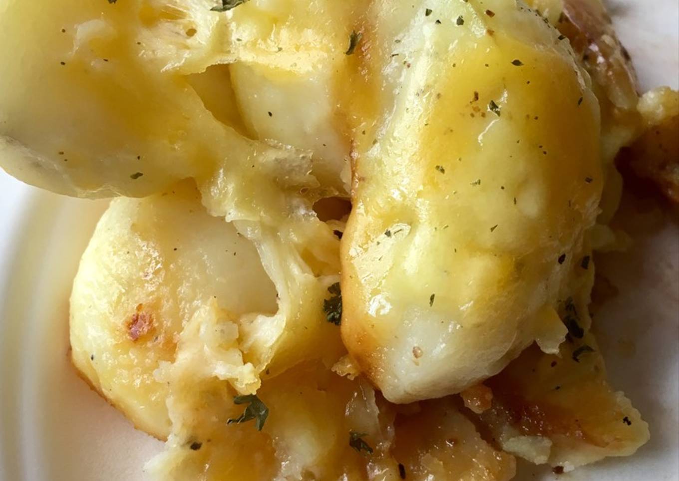 Papa con queso cheddar