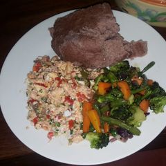 Brown ugali, fried eggs and mixed vegetables A picture of Brown ugali, fried eggs and mixed vegetables.