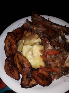 A picture of Sweet potato, plantain nd grilled chicken sauce.