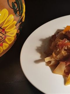 A picture of Cabbage with Duck Confit.