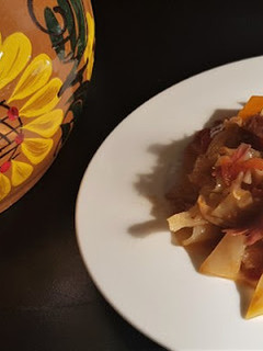A picture of Cabbage with Duck Confit.