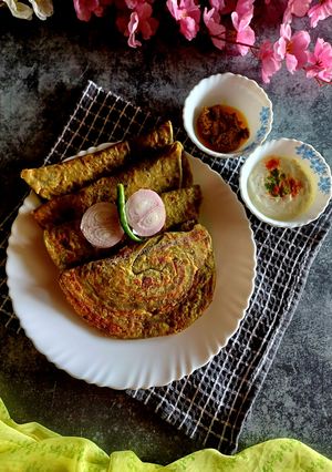 A picture of Palak Paneer Paratha (Cottage cheese stuffed Spinach Flatbread).