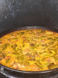 Una foto de Paella