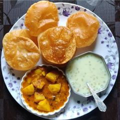 A picture of Aloo Sabzi Puri.