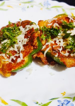 A picture of Cheesy egg stuffed peppers.