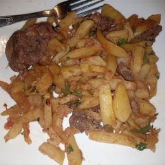 A picture of Chips and beef.