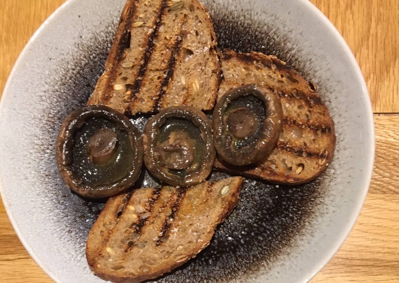 Juicy portabellini mushrooms on seedy toast