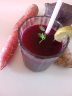 A picture of Beetroot and carrot juice.