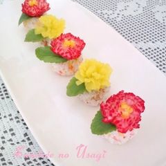 A picture of Radish Chrysanthemum Sushi Balls for Doll Festival or Mother's Day.