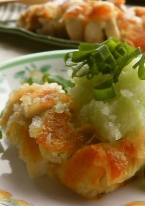 A picture of Soft and Crispy Chicken Breast Topped with Grated Radish.