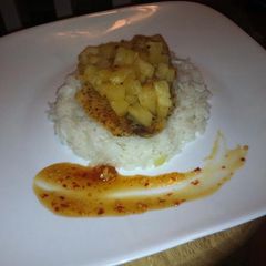 Pinnapple Baked Tilapia With A Yellow Pepper Pilaf With A Pinnapple Chilli Reduction Sauce A picture of Pinnapple Baked Tilapia With A Yellow Pepper Pilaf With A Pinnapple Chilli Reduction Sauce.