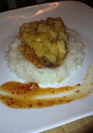 A picture of Pinnapple Baked Tilapia With A Yellow Pepper Pilaf With A Pinnapple Chilli Reduction Sauce.