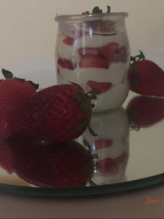 Una foto de Fresas con crema de queso