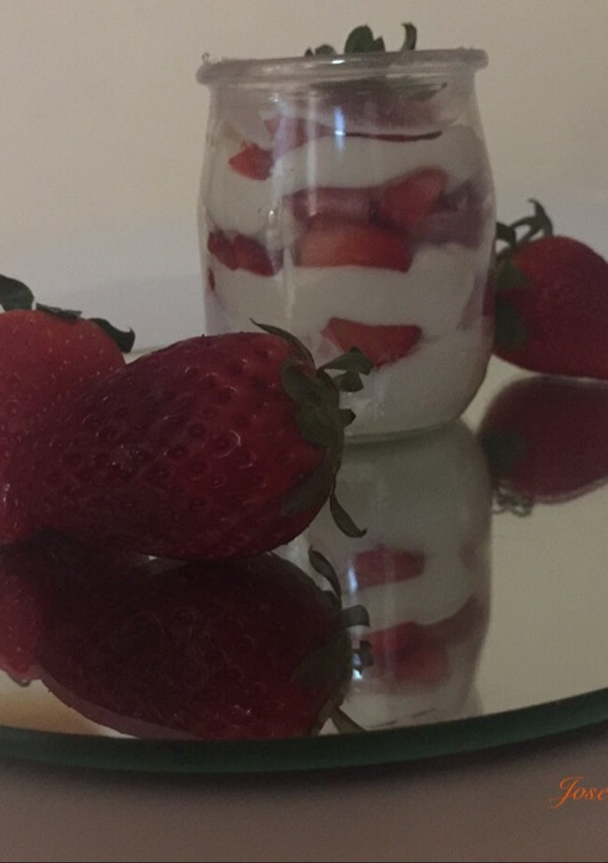 Una foto de Fresas con crema de queso