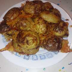 Una foto de Patatas crujientes parmesana