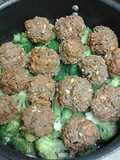 Kofta on a bed of broccoli