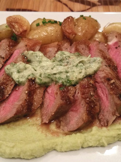 A picture of Strip Steak with Cauliflower puree and roasted garlic potatoes.