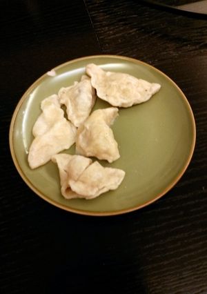 A picture of Homemade pork and mushroom ravioli.