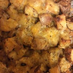 A picture of Cheesy Italian Herb Roasted Red Potatoes.