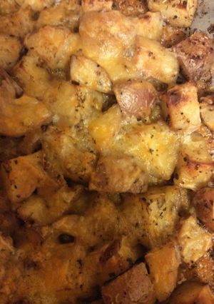 A picture of Cheesy Italian Herb Roasted Red Potatoes.