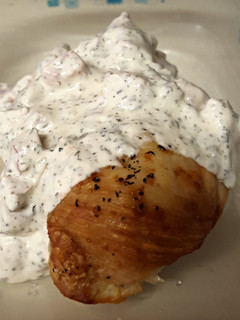 A picture of Baked Chicken Breasts with Creamy Basil Sauce.