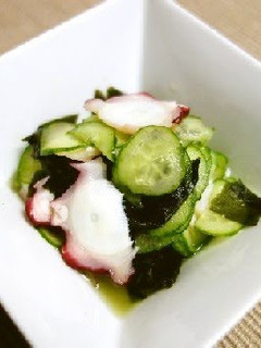 A picture of Octopus and Cucumber with Wakame Seaweed in Vinegar.