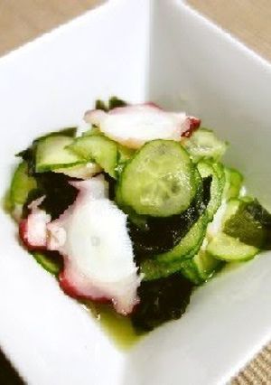 A picture of Octopus and Cucumber with Wakame Seaweed in Vinegar.