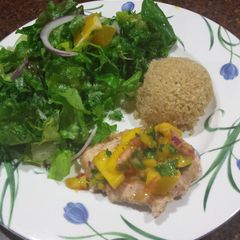 A picture of Tilapia with mango salsa.