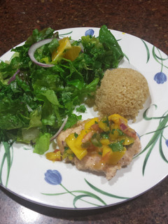 A picture of Tilapia with mango salsa.