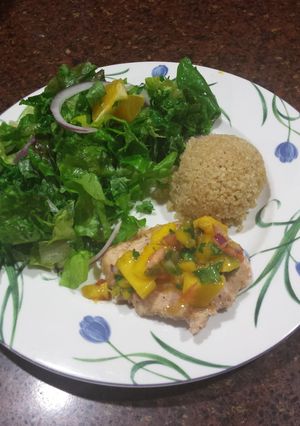 A picture of Tilapia with mango salsa.