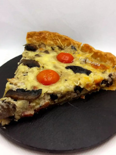 Una foto de Quiche de champiñones y bacon