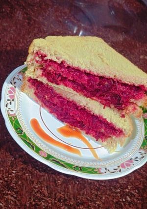 A picture of Beetroot 3 tier sandwich.