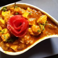 A picture of Roasted Paneer in peanut gravy.