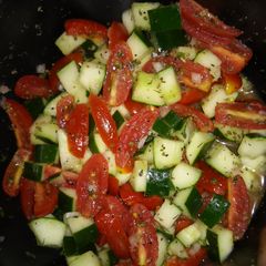 A picture of Cucumber & Tomato Salad.