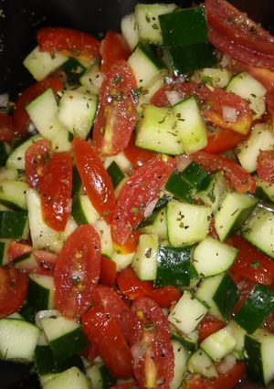 A picture of Cucumber & Tomato Salad.