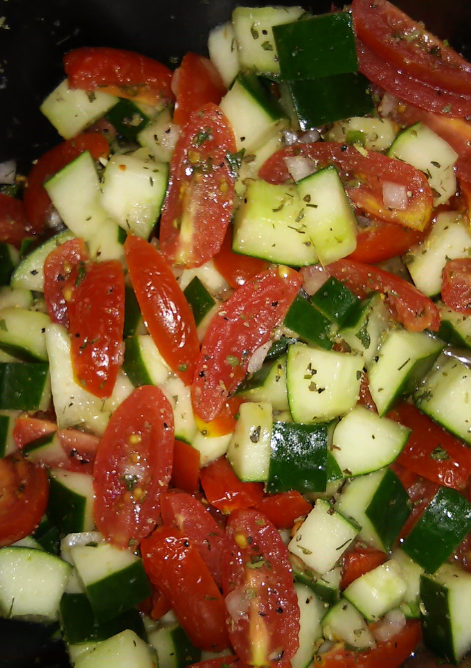 A picture of Cucumber & Tomato Salad.