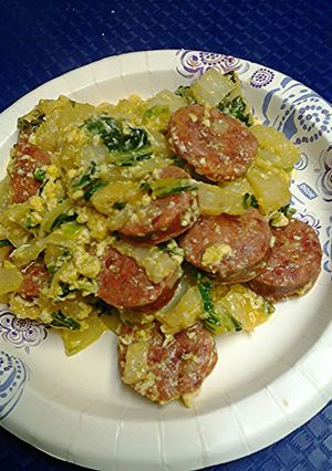 A picture of Smoked sausage with bok choy( Chinese cabbage).