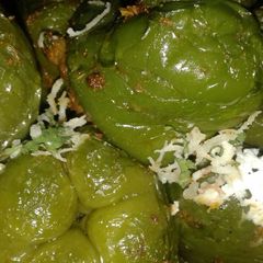 A picture of Baked stuff capsicums.