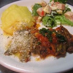 A picture of Baby Sardine & Tomato Sauté with Polenta.