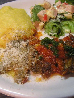 A picture of Baby Sardine & Tomato Sauté with Polenta.