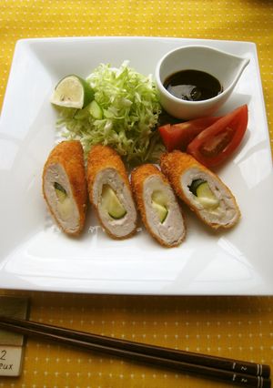 A picture of Deep-fried and Breaded Chicken Rolls with Cheese.