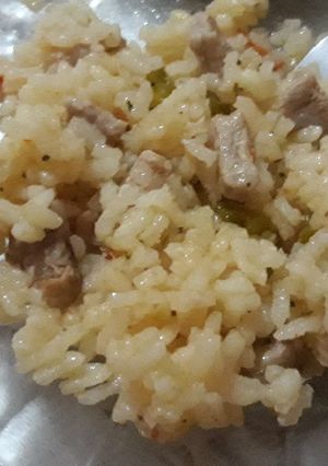 Una foto de Arroz con lomo a mi gusto