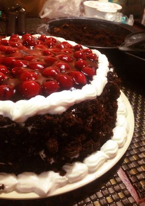 A picture of Cherry-full Blackforest Cake.